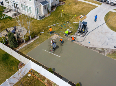 Aerial View of Pouring Concrete in Backyard