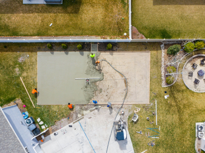 Aerial View of Pouring Concrete in Backyard