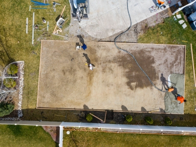 Aerial View of Pouring Concrete in Backyard