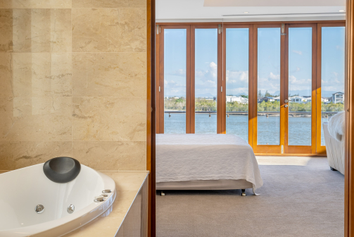 View of Bedroom from Bathroom Real Estate Photography